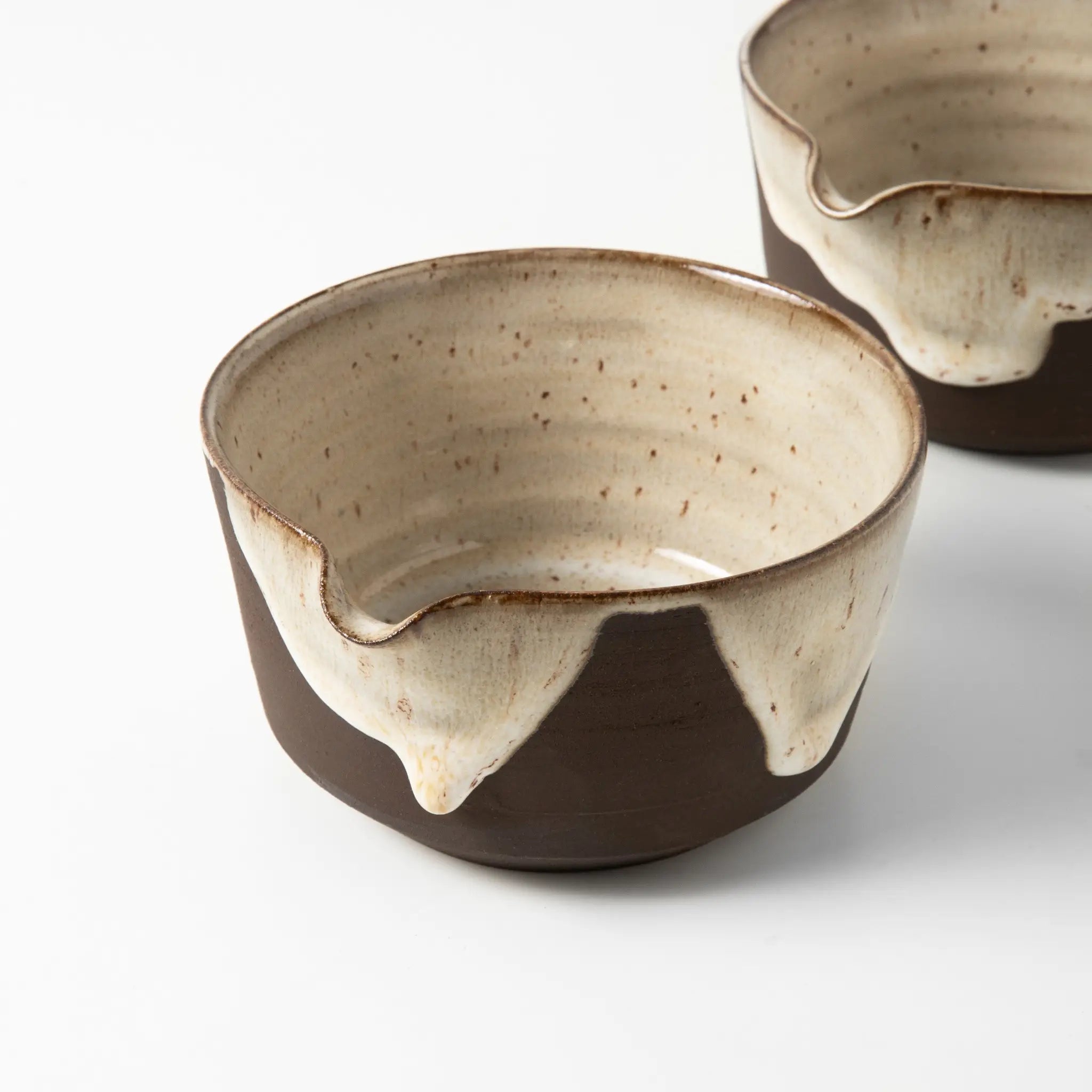 Handmade black clay matcha bowl with glaze finish and spout for easy pouring