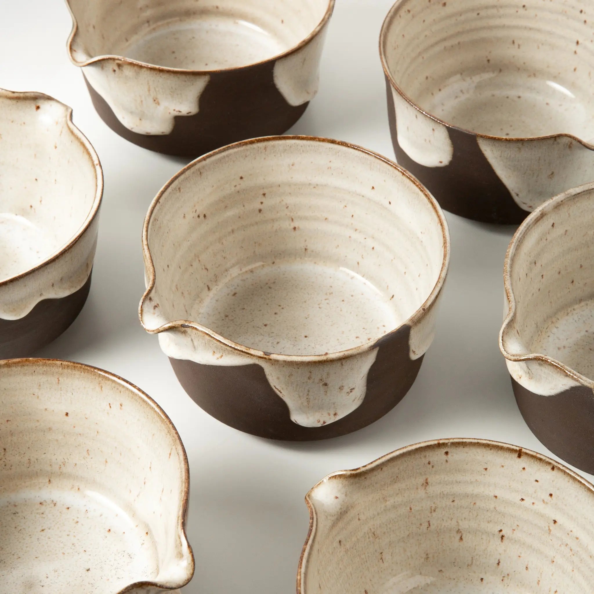 Handmade black clay matcha bowl with glaze finish and spout for easy pouring