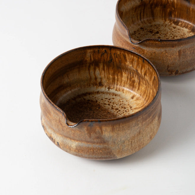 Handmade ceramic stoneware matcha bowl in brown reactive glaze