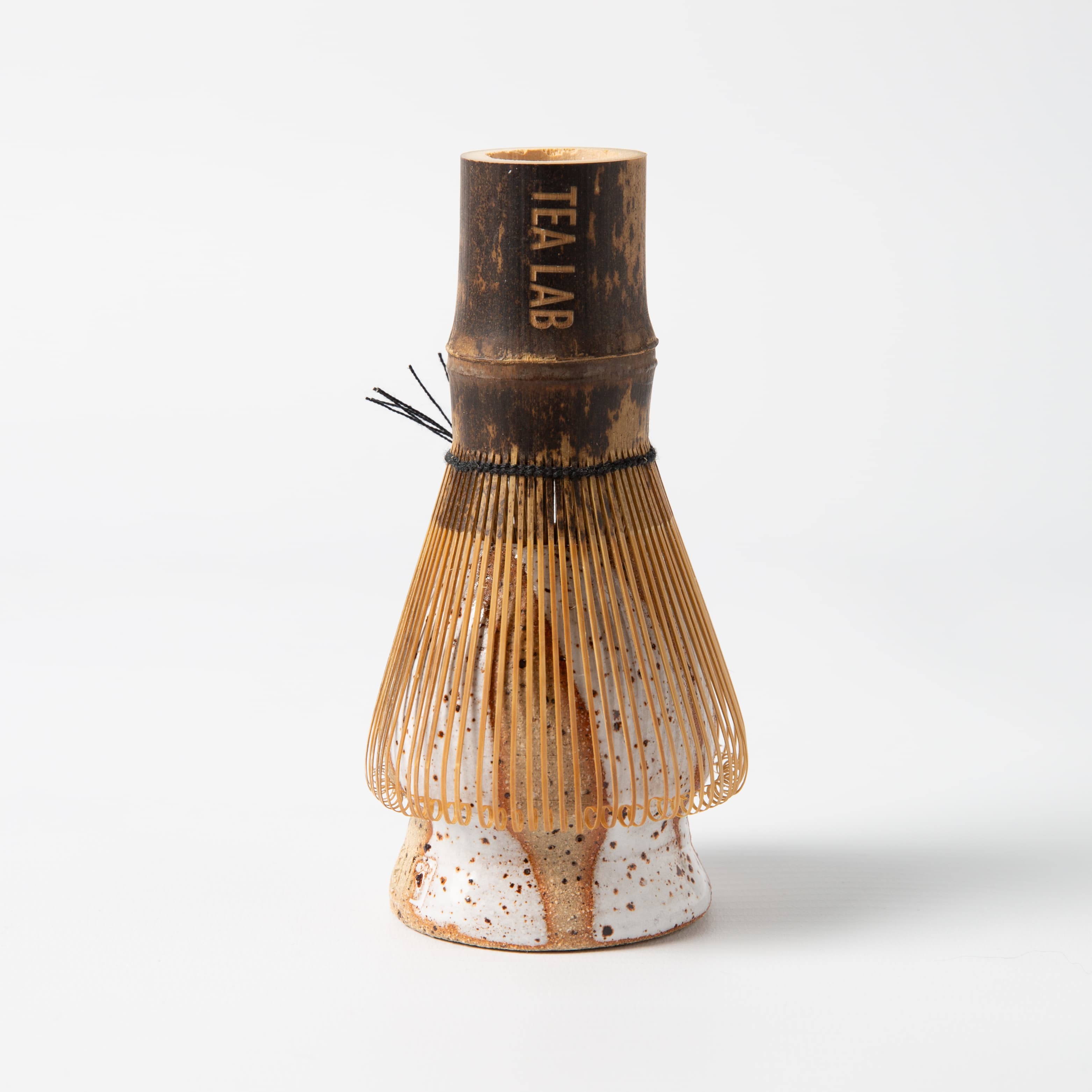 Handmade matcha whisk holder with reactive speckled glaze