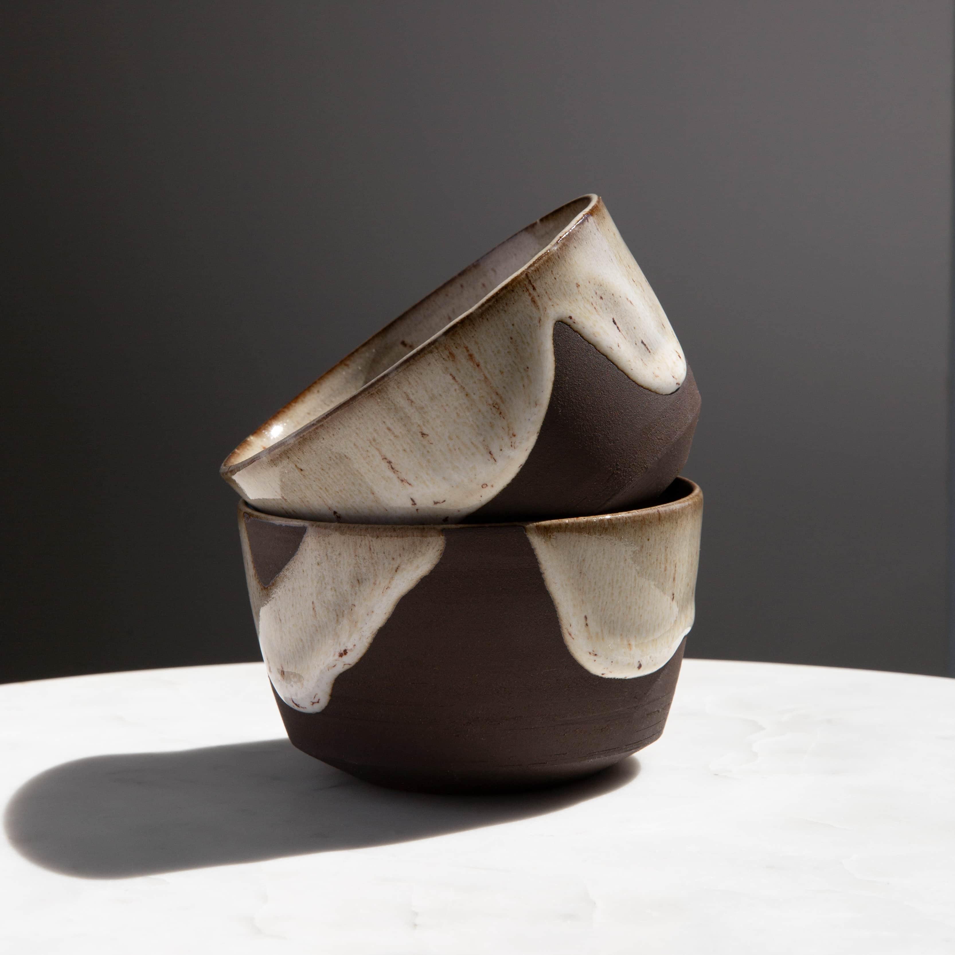 Handmade ceramic dark drip reactive glaze cups for lattes