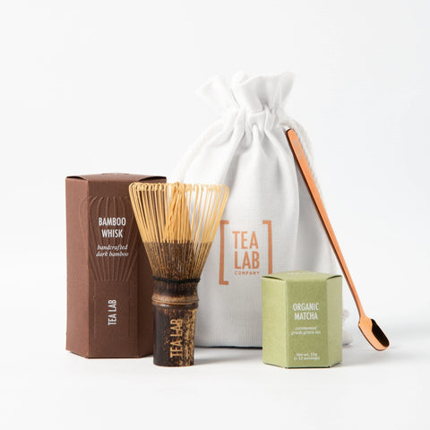 Tea Lab Matcha Starter Kit with organic ceremonial matcha, dark bamboo whisk, and copper spatula — ideal for beginners or gifting.